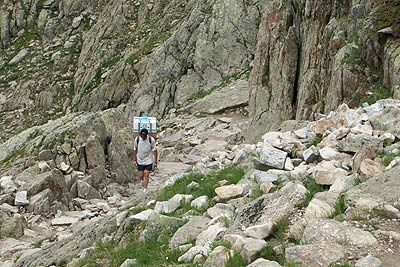 Porter with supplies for Refuge de Bel Lachat