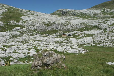 Chalets de Platé are hidden amongst the limestone