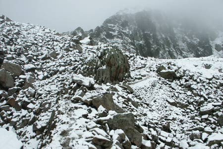 Approaching Col du Lac Cornu with late June snow