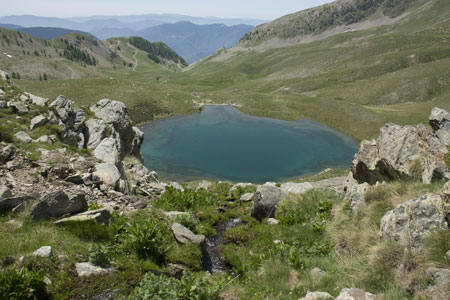 Loking west over Lac Petit towards the Col de Veillos