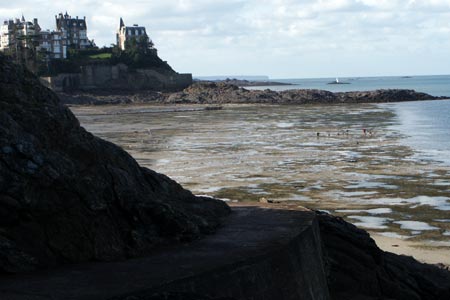 The rocky foreshore at Dinan with its small beaches