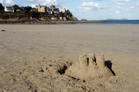 Gothic villas on the clifftop at Dinan above Priory Beach