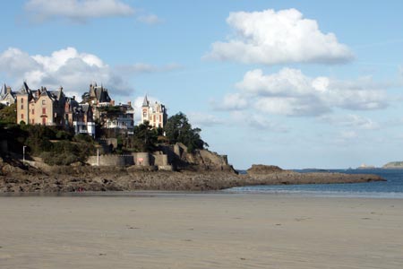 Cold winter sunshine means the beach at Dinan is empty