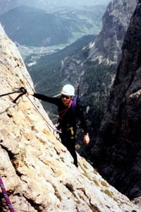 Exposed traverse on the Pisciadu Climbing Path