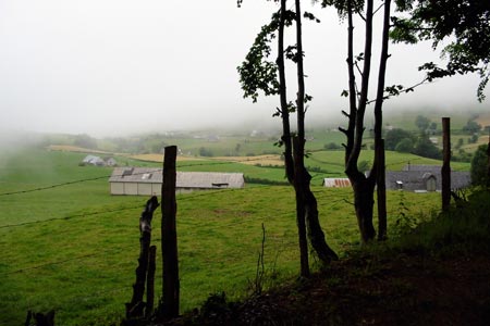 A curtain of clouds obscuring the top half of the view, near Lescun